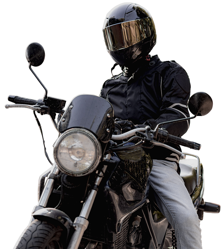 Motorcyclist in helmet and riding gear